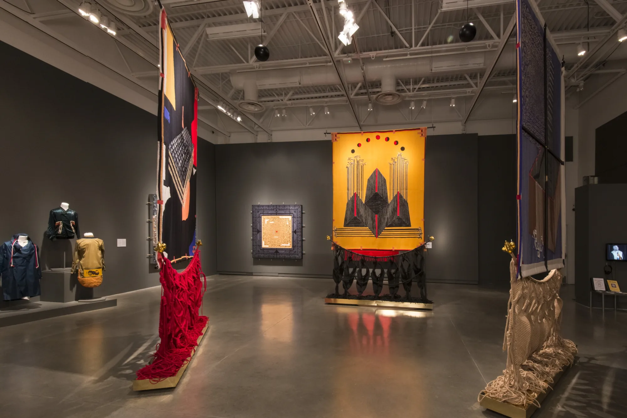 Installation view — Collection of Paradise Sportif and Malcolm’s Smile, against Confirmation B, with Ishmael Butler’s Ecdysis, 2015